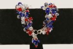 Unique, red, white and blue Swarovski crystal bracelet with sterling silver chain.
