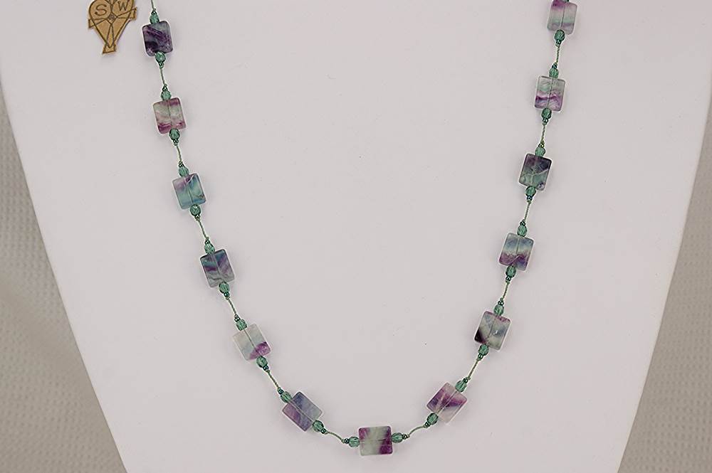 Purple and teal tourmaline stone necklace.