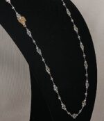 38 inch long necklace with silver glass beads.