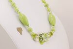 necklace with lime green and ivory colored gold dusted glass beads