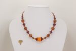 orange and amethyst colored glass bead necklace