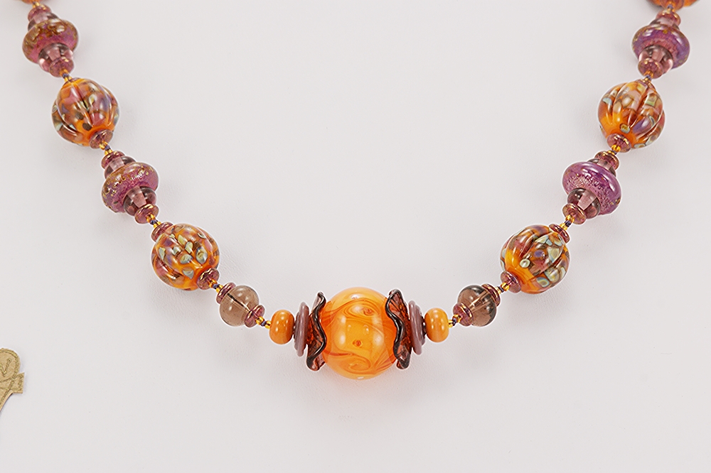 orange and purple glass beaded necklace
