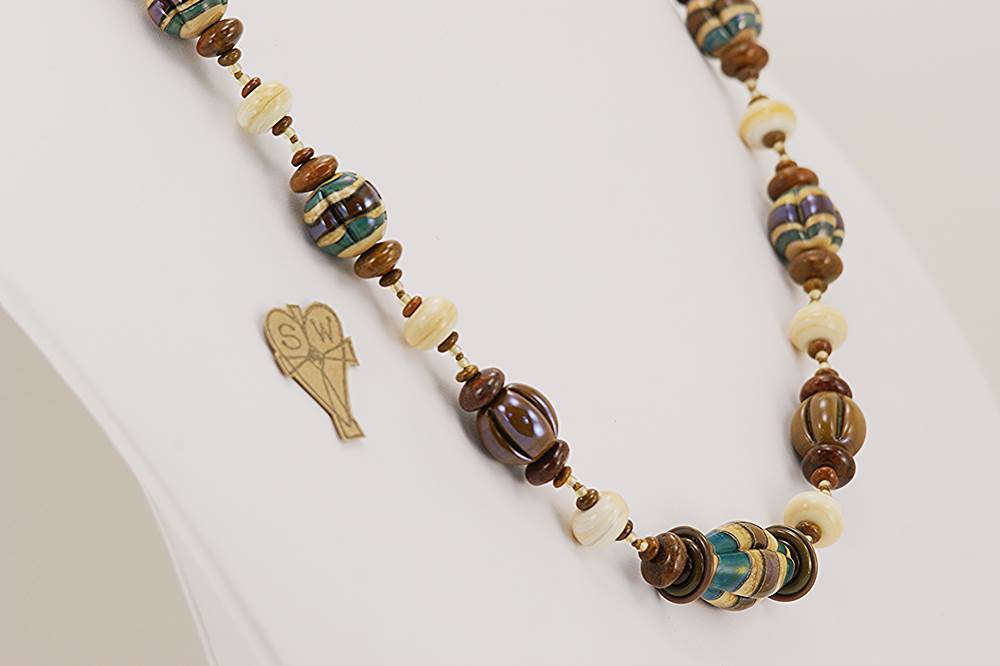 Handmade necklace with chestnut, ivory and teal colored glass beads.