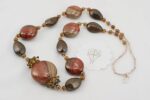 Rusty red grey and black glass bead necklace.