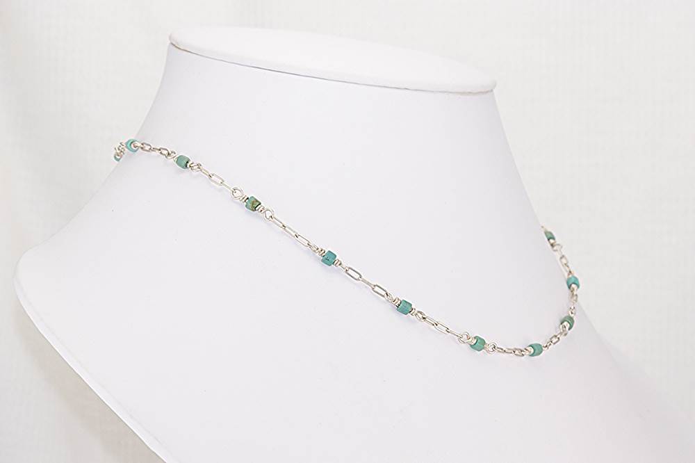 Handmade sterling silver open box chain necklace with turquoise beads.