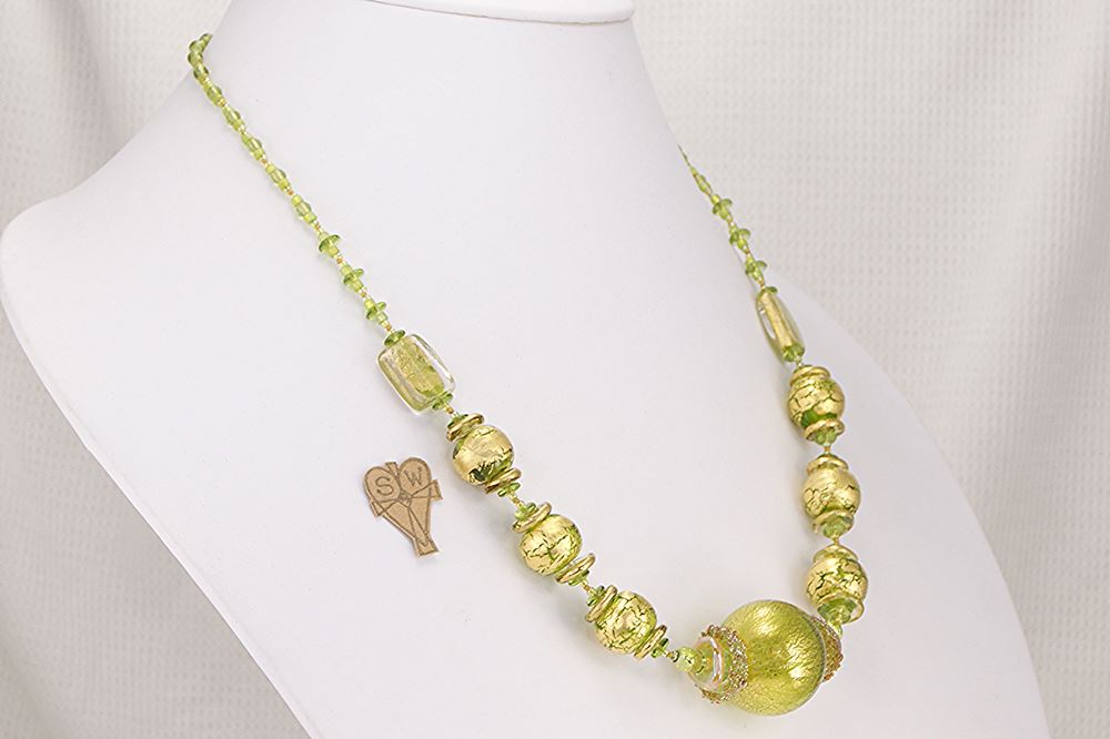 One of a kind green and gold blown glass bead statement necklace.
