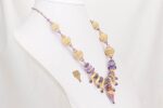 Orchid and soft beige colored glass bead necklace with purple Mojave sugilite turquoise.