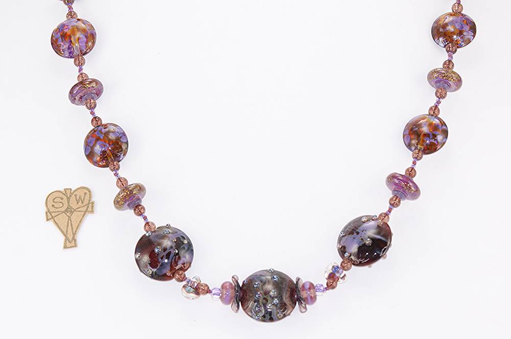 Handcrafted raspberry and purple grape glass bead necklace.