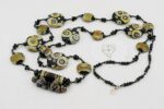 Black, brown and ivory color glass bead necklace.
