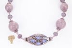 Handmade plum purple glass bead necklace.