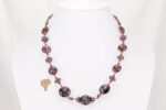 Handmade raspberry and purple grape glass bead necklace.