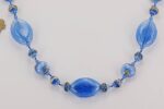 Cobalt blue glass bead necklace 31 inches long.