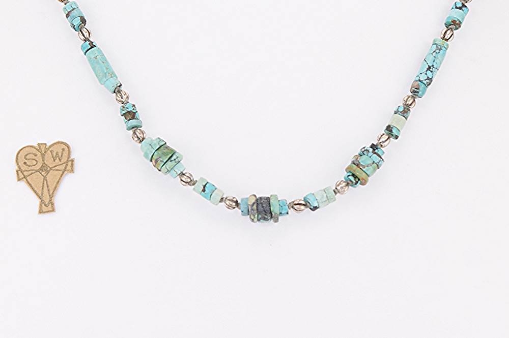 Necklace made with old turquoise trading beads and sterling silver beads.