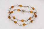 2 bracelet set made of copper colored glass beads with sterling silver.