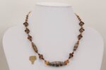 Copper brown and grey colored glass bead necklace.