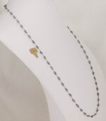 33 inch long necklace made with faceted, rutilated, black, smokey quartz and hematite beads.