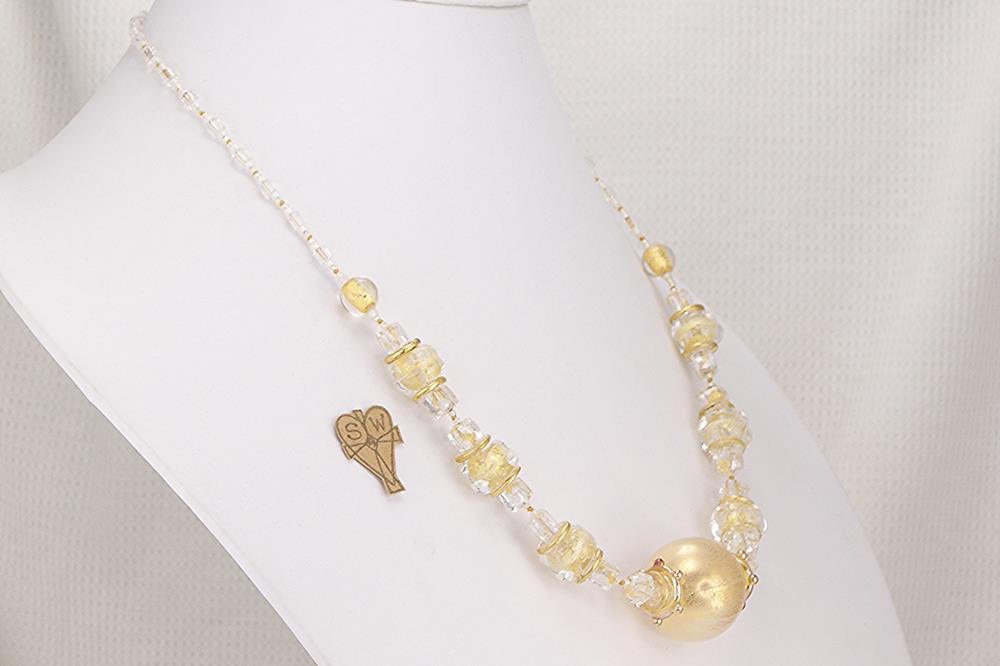 Fabulous necklace hand made with blown quartz beads lined with gold and silver leaf.