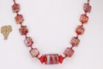 Eye catching red Murano and dichroic glass bead necklace.