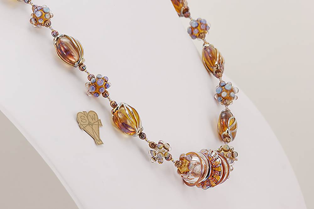 opalescent glass bead necklace with rose gold and sterling silver accents.