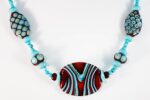 Red and bright turquoise glass beaded necklace.