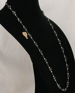 35 inch long, faceted, black spinel and freshwater pearl necklace.