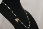 Baroque freshwater stick and round pearl necklace.