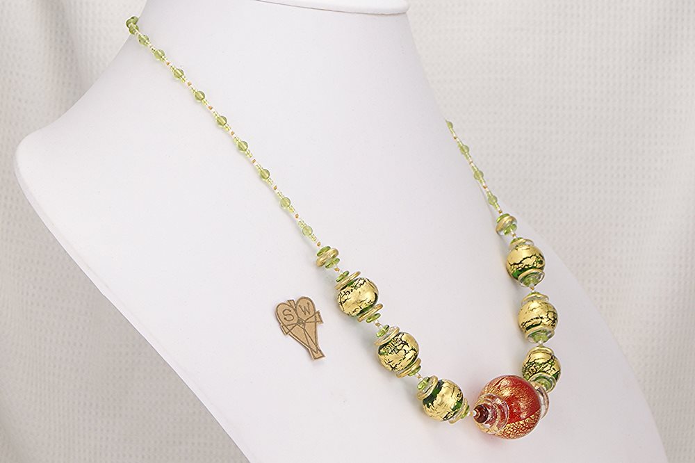 One of a kind necklace made of red and green blown glass beads with gold leaf finish.