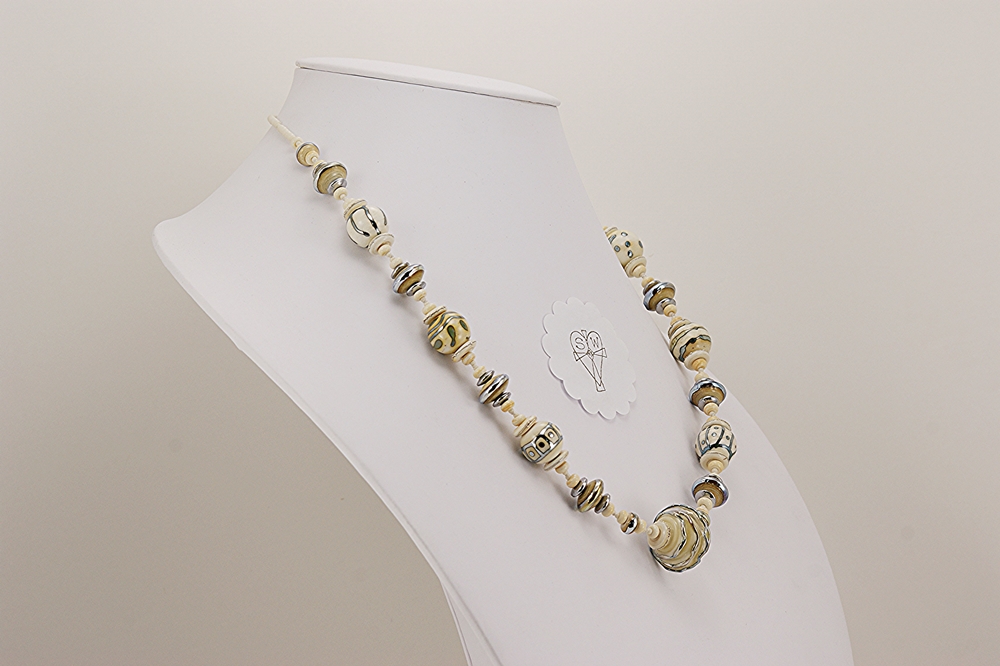 necklace made from ivory colored silver accented glass beads