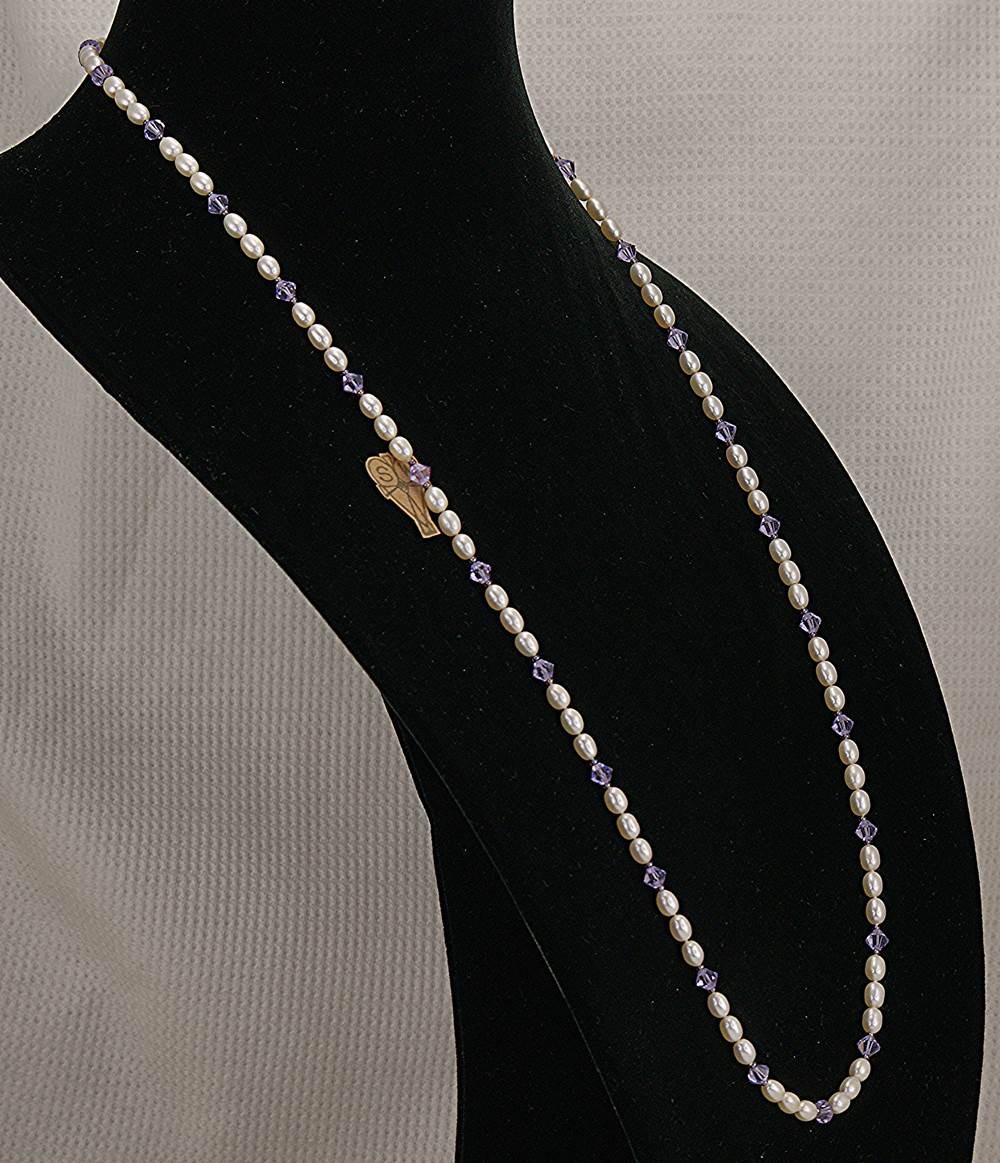 Freshwater pearl necklace with amethyst Swarovski crystals.