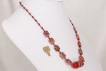 One of a kind, eye catching necklace made of deep red dichroic and Murano glass beads