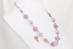 Pink and light lavender glass beaded necklace.