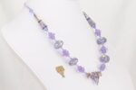 Brilliant purple violet glass bead necklace with gold and sterling silver highlights.