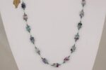Purple and teal tourmaline stone necklace.