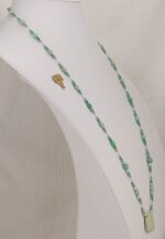 Necklace handmade of vintage American turquoise beads with pendant from the Nevada Pixie mine.