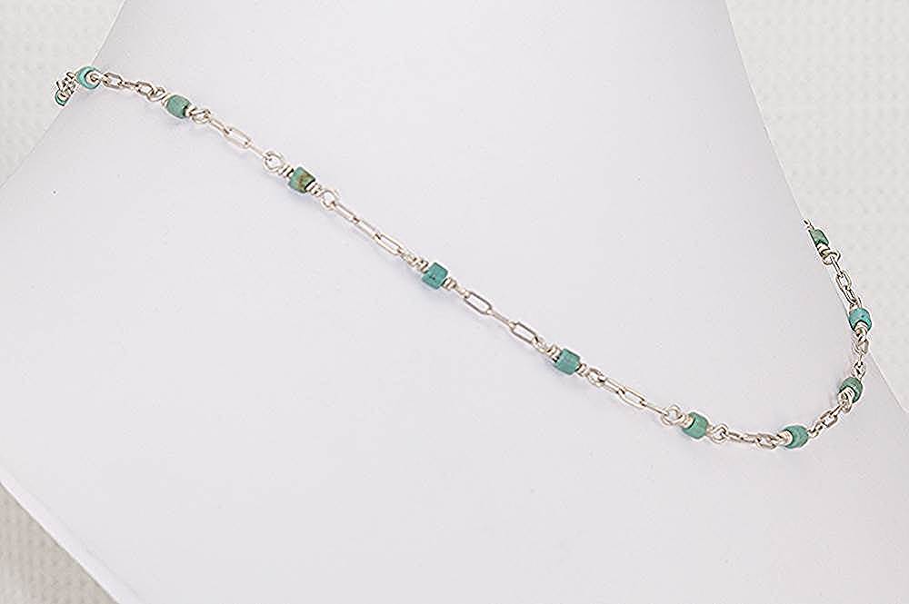 Handmade necklace with natural turquoise and sterling silver.