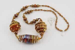 necklace with copper bronze and silver colored glass beads