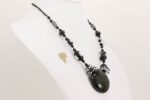 necklace with black and clear glass beads