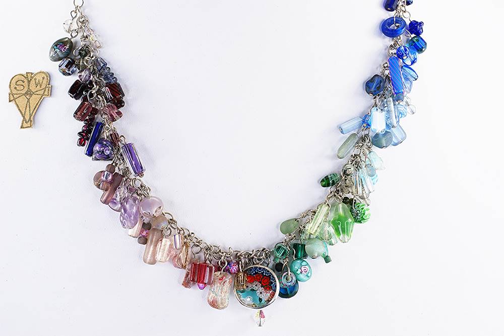 Handmade sterling silver chain necklace with a multi color collage of semi precious stone and glass beads.