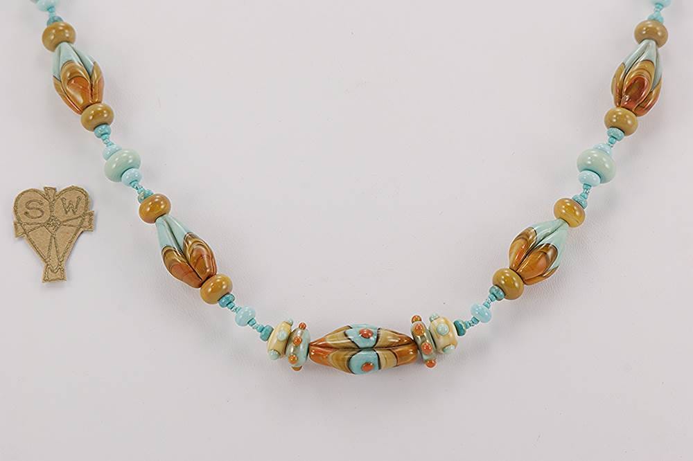 Turquoise and terracotta colored glass bead necklace.