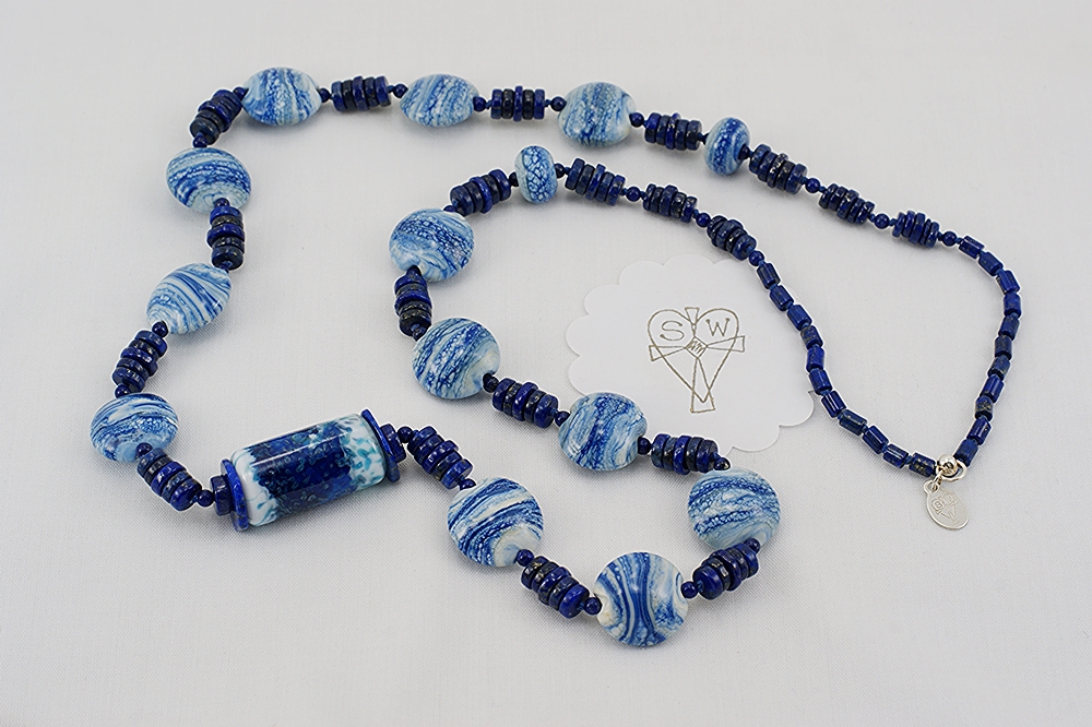 Handmade cobalt and white glass bead necklace with lapis lazuli.