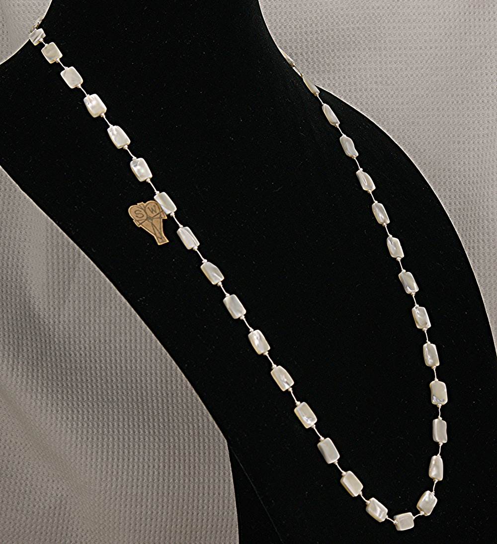 Mother of pearl, rectangular bead and natural pearl necklace.