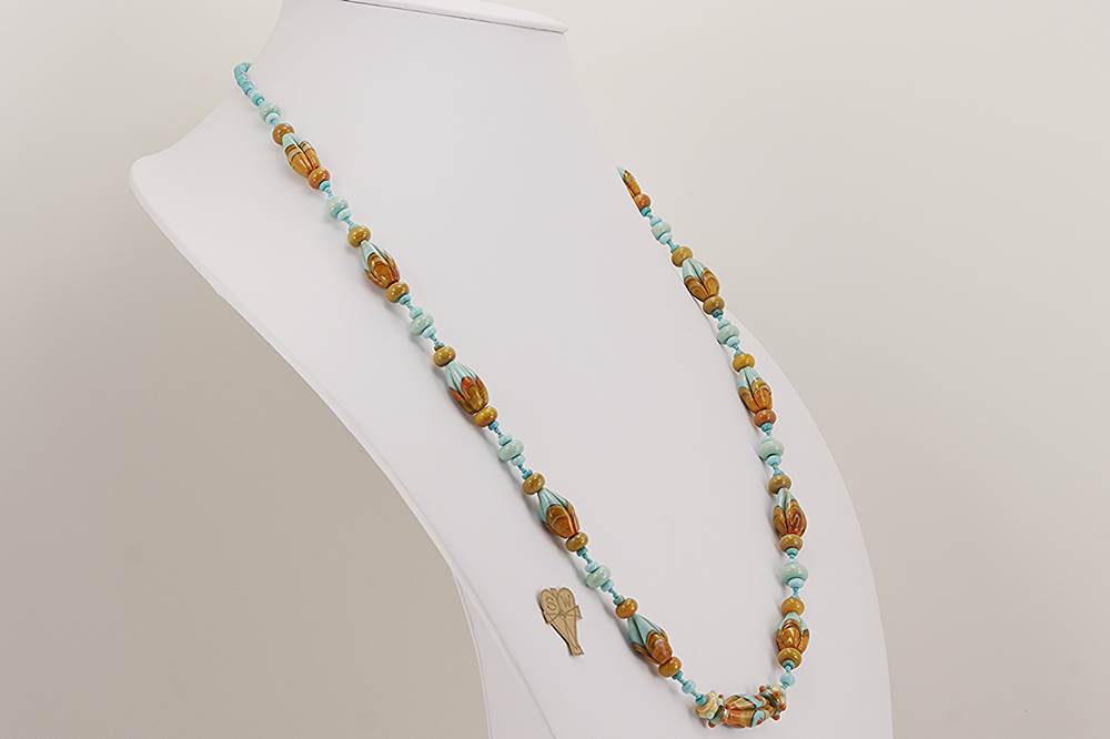 Turquoise and terracotta glass beaded necklace.