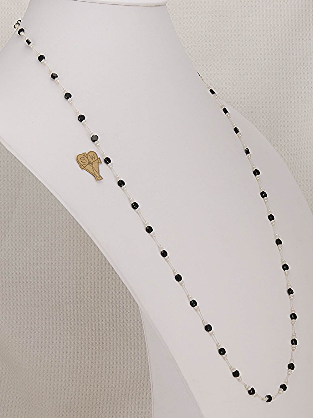 Handmade necklace with moonstone, black, faceted spinel and micro freshwater pearls.