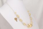 Fabulous necklace hand made with blown quartz beads lined with gold and silver leaf.