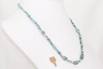 Handmade sterling silver and old turquoise beaded necklace.