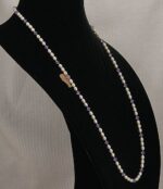 Freshwater pearl necklace with amethyst Swarovski crystals.