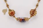 necklace with copper bronze and silver colored glass beads