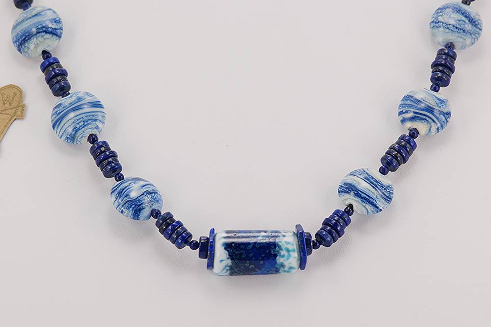 Cobalt blue and white glass bead necklace with lapis lazuli.