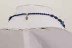 Cobalt and white glass beaded necklace with lapis lazuli stone.