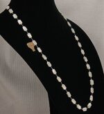 Mother of pearl, rectangular bead and natural pearl necklace.